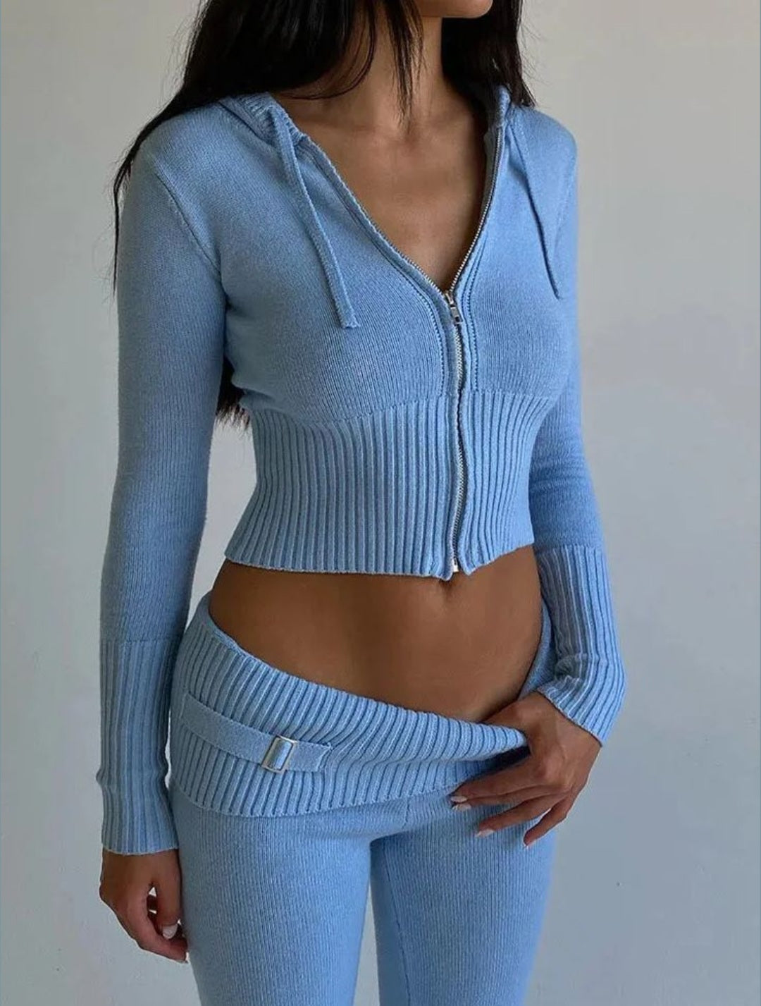 ribbed zip-up sweater and matching high-waisted fitted pants